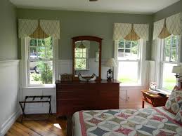 This elaborate flouncy valance tops casement windows and softens the architecture in a little girl's room. Julie Fergus Asid Nh Interior Designer Custom Valances Window Treatments Living Room Living Room Windows Bedroom Window Design