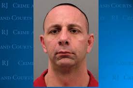 Las Vegas man accused of impersonating officer at Henderson massage parlor 