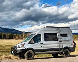 This Sportsmobile 4x4 Ford Transit Outfitted With Aluminess Gear Ready To Be Released Into The Wild Ford Transit Ford Transit Campervan Ford Transit Camper
