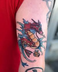 The orange to blue color contrast is even very similar to the color schemes of magikarp and gyarados. Red Gyarados Tattoo Done By Darin The Ink Sling Studio Facebook