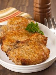 And line a baking sheet with foil or parchment paper. Oven Fried Parmesan Pork Chops Recipe Mygourmetconnection