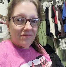 What are some ideas for concealing a Sig P365 while wearing fitted clothing  and yoga pants as a massage therapist?