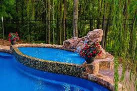 Build yourself a space where you can comfortably tan by setting up a good fence and some strategically placed shrubbery. Fiberglass Tanning Ledges Tallman Pools
