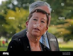 Westchester Medical Center chief administrative officer Kara Bennorth  answers questions during a news conference outside the hospital, Wednesday,  Aug. 8, 2018, in Valhalla, N.Y. A man shot a female patient and then
