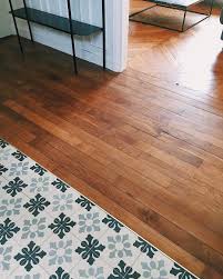 Grey And White Cement Tile With Classic Tile Pattern Combined With Mahogny Coloured Wooden Floor Using Diffe Wood Floor Design Wooden Floor Tiles Classic Tile