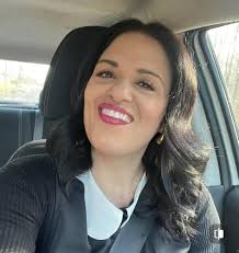 Can anyone lighten this picture of me and my late husband as the figures  are dark?