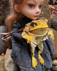 Well, bad news. I got Tanith's toad safely returned, but it seems he did  pick up a mild enchantment while he was in the woods. It's a growing spell.  The longer you