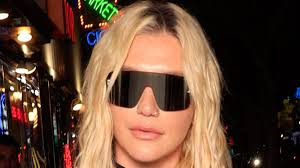 Kesha goes braless in a semi-sheer black top as she attends the exclusive  Posse Pride Party at The Viper Room