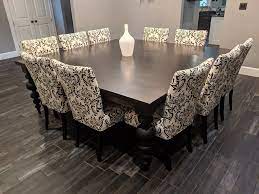 If you don't have a ton of space for a long table, consider a square one. Turned Leg Square Dining Table For 12 By James And James James James