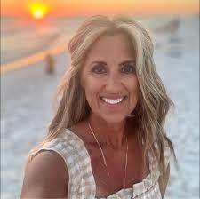 My mom Dorie Giannone Husak. Around 1958. Digging bait for my grandparents  fishing station. The station was owned by Grandparents Frank and Anna Husak  and their partners Pete and Irma Veenees. It