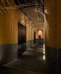 Design Detail A Curved Bamboo Arch Welcomes Patrons To This Japanese Restaurant And Bar Architect Design Bamboo Architecture Entrance Design
