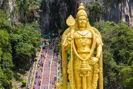 | guarded by a monumental statue of hindu deity lord murugan, the batu caves are a malaysian national treasure and an unmissable day trip from kuala lumpur. Murugan Statue At The Batu Caves Kuala Lumpur Malaysia Stock Photo Offset
