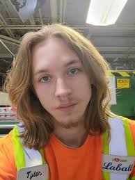 Romaine's humorous hairdo comparison to Clint