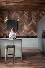 The fitted plain dark wood is perfect to transform into antique reclaimed kitchen cabinets. Dwell S Favorite Modern Kitchen Wood Backsplashes Dark Hardwood Dwell