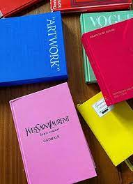 A coffee table book is a hardcover book that is intended to sit on a coffee table or similar surface in an area where guests sit and are entertained, thus inspiring conversation or alleviating boredom. The Best Coffee Table Books For Your Home 2021