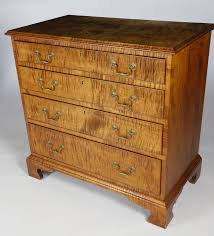 The form reflects a strong influence from the french empire, or neoclassical style. Marshall James Marshall James Tiger Maple Chippendale Style Four Graduated Chest Of Drawers On Bracket Feet Rafael Osona Auctions Nantucket Ma