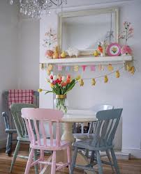 Wooden dining chairs have a range of unique finishes that will evenly mix flare and warmth. A Pastel Quartet To Dine For Painted Dining Chairs Painted Kitchen Tables Colorful Kitchen Tables