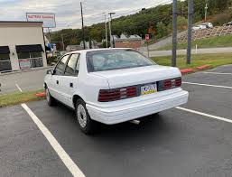 Image result for Bright White 1993 Plymouth