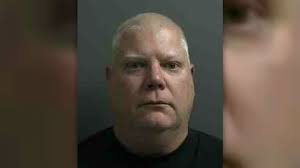 Corrections officer charged with making terroristic threat