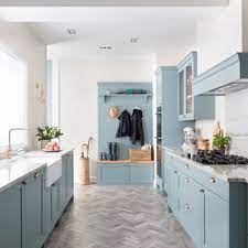 When viewed with the granite slabs of countertop the cabinets bring out the golden accents in the stone. 75 Beautiful Kitchen With Blue Cabinets And Granite Countertops Pictures Ideas June 2021 Houzz