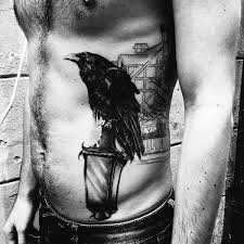 This simple design of a raven perched on a branch against a midnight blue sky is classic and timeless. Top 111 Raven Tattoo Ideas 2021 Inspiration Guide