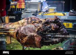 Cooking on a spit hi-res stock photography and images - Page 2 - Alamy