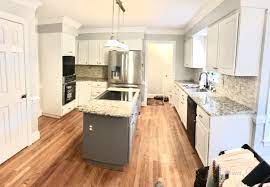 It is a dark almost masculine color that makes your whites really pop. Extra White Kitchen Dovetail Island 2 Cabinet Girls