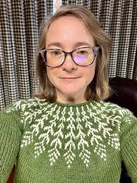 One sleeve down. I did swatch quite carefully but it's knitted up a little  bigger than the schematic, but if I have to make another it won't be a  problem, as it