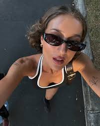 __epps styles the new Halter Top, featuring classic 90's contrast piping, a  confidence boosting staple.