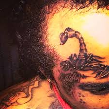 Lil wayne frequently uses illuminati symbols and imagery in his music videos, such as my homies still. in it, you can clearly see references to sacrificial lambs, skulls, the baphomet, girls with horns on their heads, and pyramid jewelry. Tommy Lee Protege Tattoo 666 On His Forehead Urban Islandz