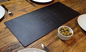 This sandra table runner features lovely quality crushed velvet with a sparkly diamante strip of bling down the centre. Giftag Artisan Black Bonded Leather Table Runner Mat Dining Centrepiece 60cm X 27cm Made In Uk Buy Online In Montenegro At Montenegro Desertcart Com Productid 93594568