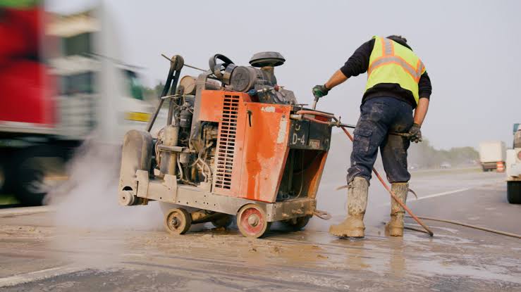 Heavy-Duty Diamond Slab Sawing in Progress, AI generated