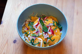 Moroccan carrots (simmer whole carrots with a clove of garlic until tender, slice on the diagonal and dress with lemon juice, olive oil, salt, cumin, cayenne, cinnamon, nutmeg, the cooked garlic clove, mashed, and a dusting of minced parsley); Moroccan Dinner Party The Simmering Pot