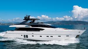 The yacht's sundeck features a bar with seating covered for shade. Ace Yacht Sanlorenzo 26 82m 2019