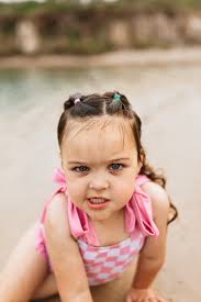 My girl swimming with her best friends at Nanny Goat beach.