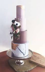 We can reproduce them or use them as inspiration for custom wedding cake designs for you. Pink And Purple Colored Wedding Cakes Arabia Weddings