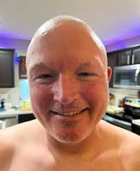 We took the elevator to the top floor of our resort — 22 stories! Knox is  scared of heights but even he came up with us. The view looking away from  the