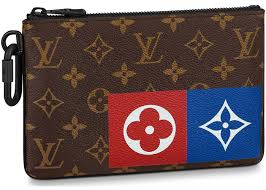 It was a monogram that went down in history as one of the most popular and fashionable pattern. Louis Vuitton Zipped Pouch Monogram Logo Story Mm Brown In Canvas Leather With Black