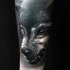Black And Grey Realism Wolf Tattoo 50 Realistic Wolf Tattoo Designs For Men Canine Ink Ideas Wolf Tattoo Design Wolf Tattoo Wolf Tattoos