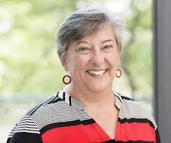 Learning to Set Conditions of Satisfaction in a Distributed World