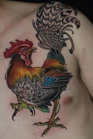 The earthly branch character represents the year of the rooster. Colored Rooster Tattoo On Man Chest Rooster Tattoo Chicken Tattoo Body Art Tattoos