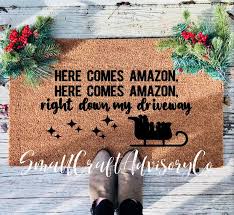 Here Comes Amazon Right Down My Driveway Amazon Holiday Mat Funny Christmas Doormat Custom Coir Mat Amazon Sleigh Doormat In 2020 Christmas Doormat Elf Christmas Decorations Christmas Humor