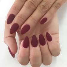 Almond Short Almond Shaped Matte Black Nails Oxblood Matte Nail Polish On The Short Pointy Nails Of Two Hands Seen In A Close Up Manicure Ideas Wine Nails Wide Nails Red Nails