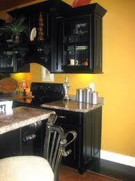A bold minimalist kitchen with sleek grey cabinetry and a sunny yellow lit up backsplash for a bright look. Pin On Ideas For The House