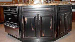 It's not for the faint of heart, certainly, but we have to say that we love the look of black cabinets in the kitchen. Age And Distress Faux Painting Of Kitchen Cabinets Everything I Create Woodworking Tutorials Paint Garage Door To Look Like Wood
