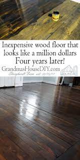 Inexpensive Wood Floor That Looks Like A Million Dollars Four Years Later Cheap Wood Flooring Staining Wood Floors Diy Wood Floors
