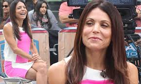 Bethenny Frankel promotes new children's book in bright fuchsia outfit