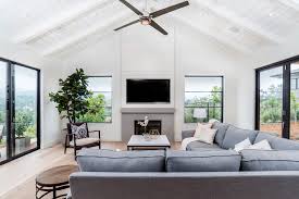 Since the space is quite small, a mirror was placed behind the display shelves, further lengthening the space visually. Natural Elements In A California Home Rue