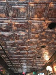 These fixtures account for the vast majority of the lighting used in drop ceiling spaces across the country. Simply Rustic Ceiling Tile Dropped Ceiling Ceiling Tiles Basement Rustic Ceiling Tile