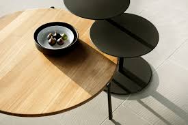 Classic moldings and plenty of shelf space make this coffee table a smart choice for transitional interiors. Branch Coffee Table Outdoor Coffee Table From Tribu